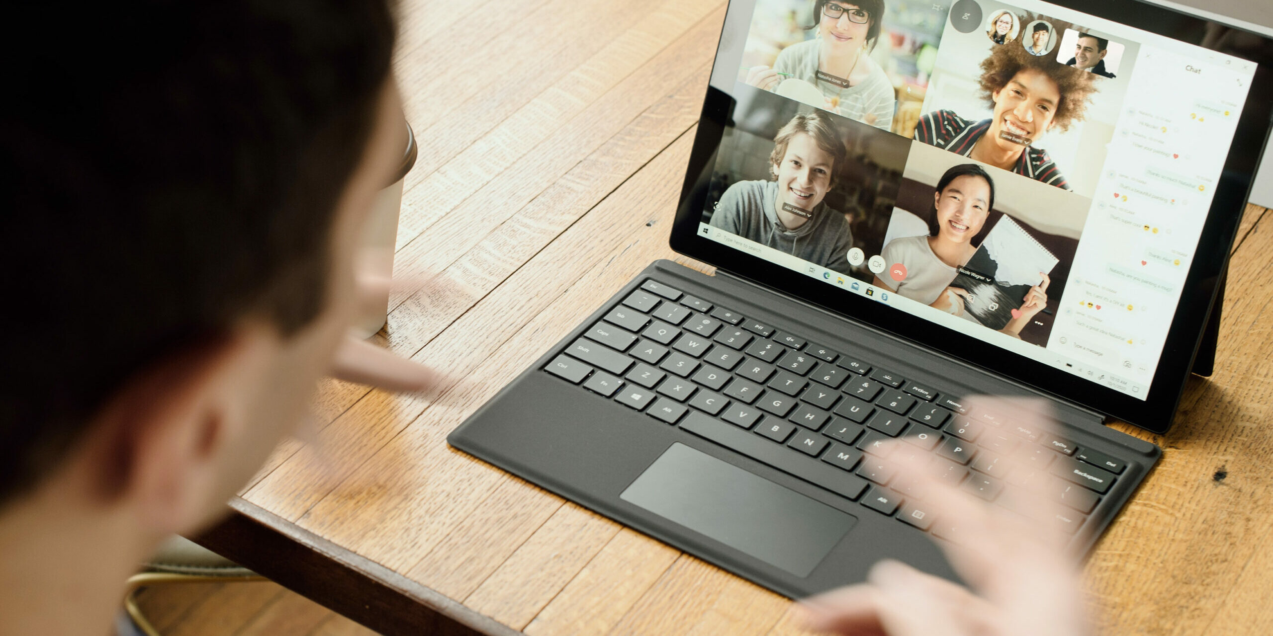 Video Conferencing Etiquette man on video call in front of laptop