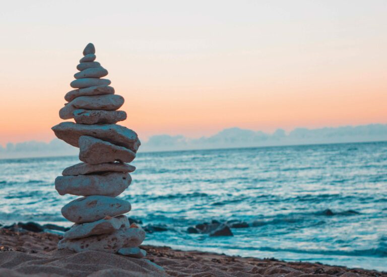 rocks and ocean workplace mental health peaceful