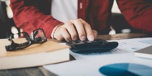 An ecommerce marketing manager working at a desktop.