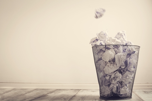 Garbage basket filled with the worst interview questions