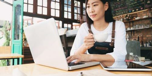 woman working on computer content strategy