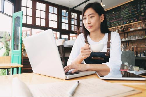 woman working on computer content strategy