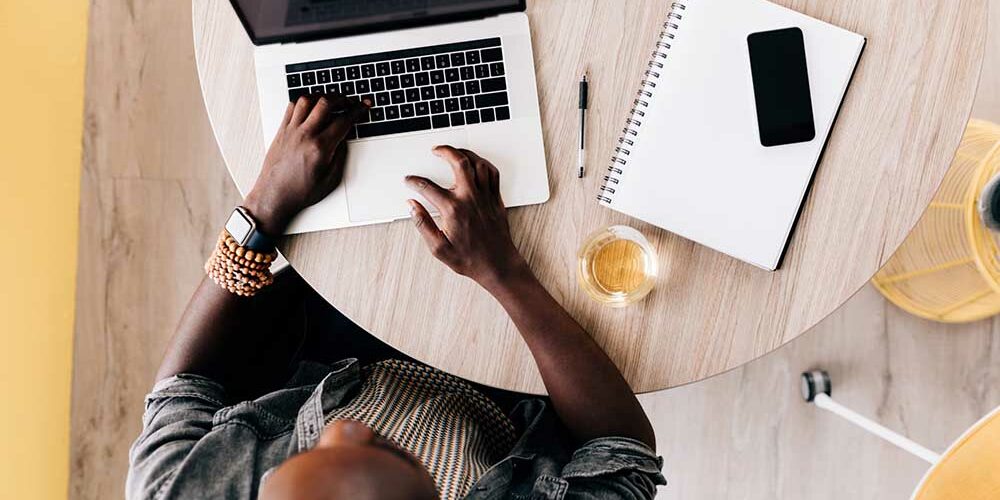 copywriter sitting at desk working