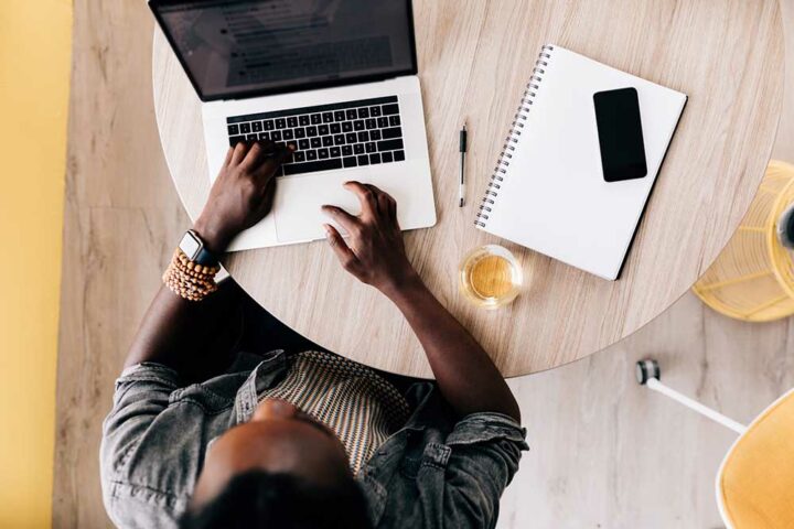 copywriter sitting at desk working