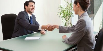 Man interviewing a woman