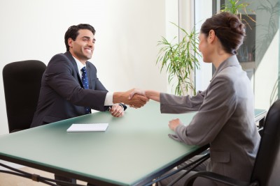 Man interviewing a woman