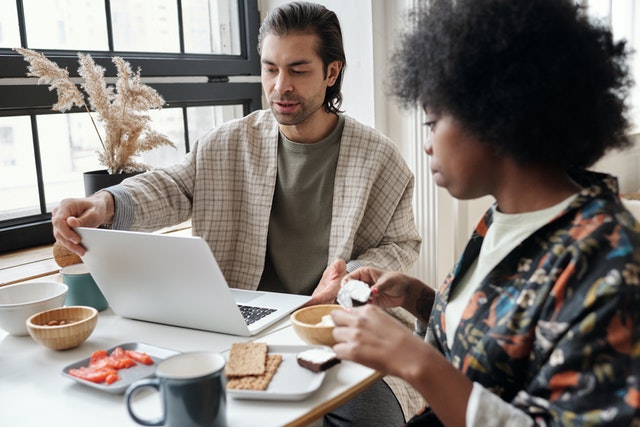 couple works at desk remote work after covid-19