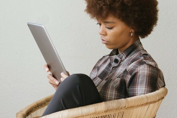 woman on furlough on tablet