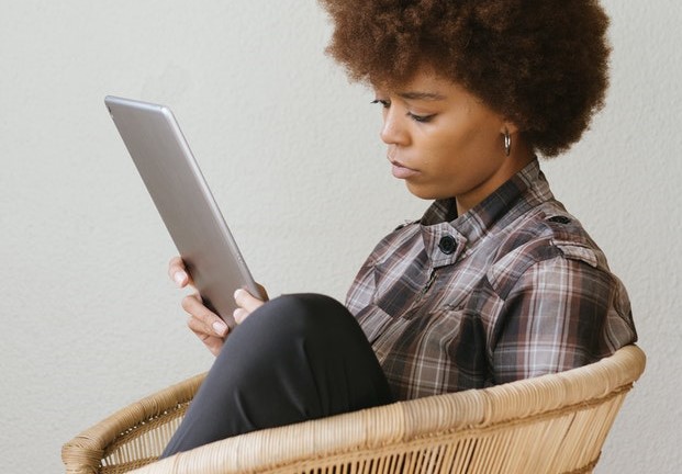woman on furlough on tablet