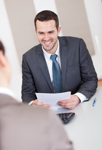 man smiling in an interview