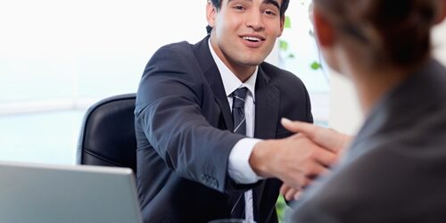 man interviewing a woman