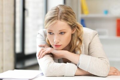 woman sad at her desk