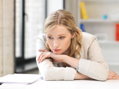 woman sad at her desk