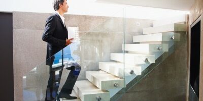 man walking up a flight of stairs