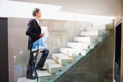 man walking up a flight of stairs