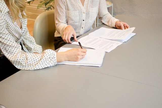 marketing recruiter and candidate meeting at table