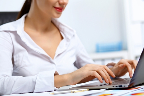 woman working at her laptop