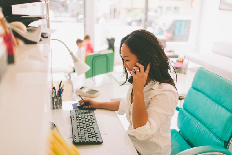 woman talking to client on phone