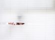 person peaking in blinds for reference check