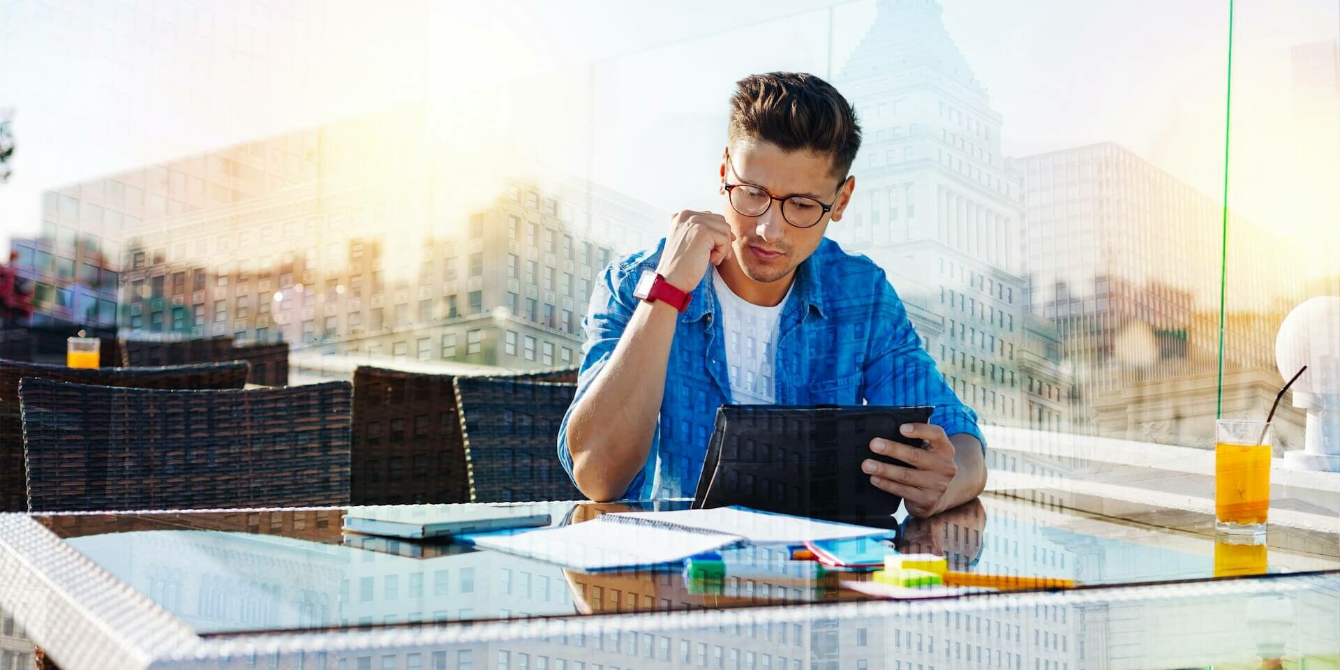 human-in-the-loop-AI professional using a tablet interacting with technology